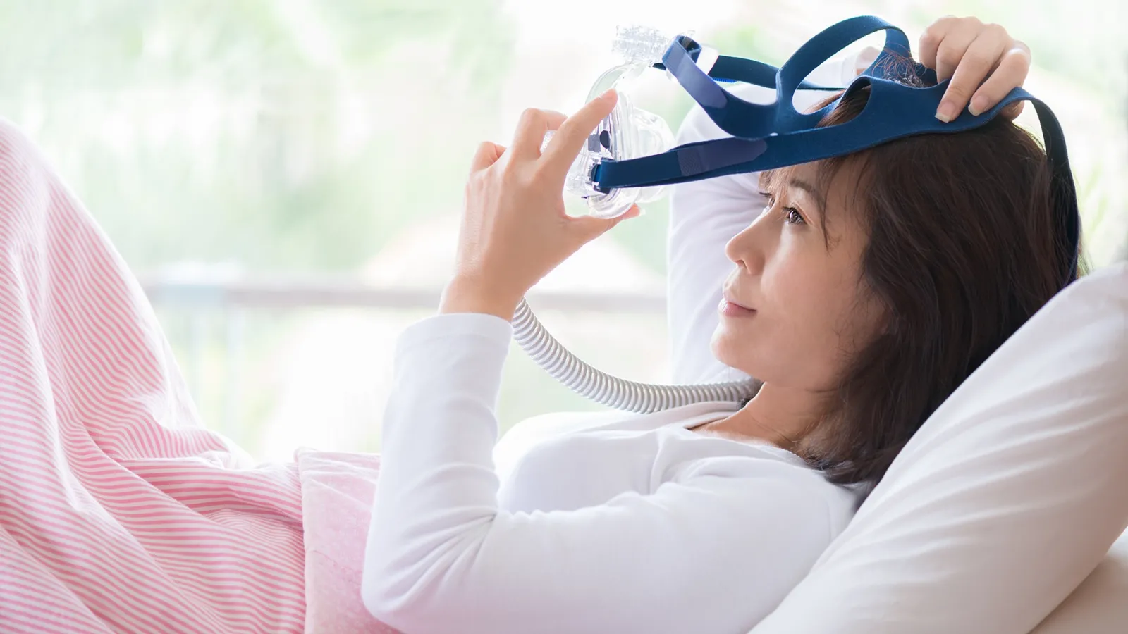woman with cpap mask